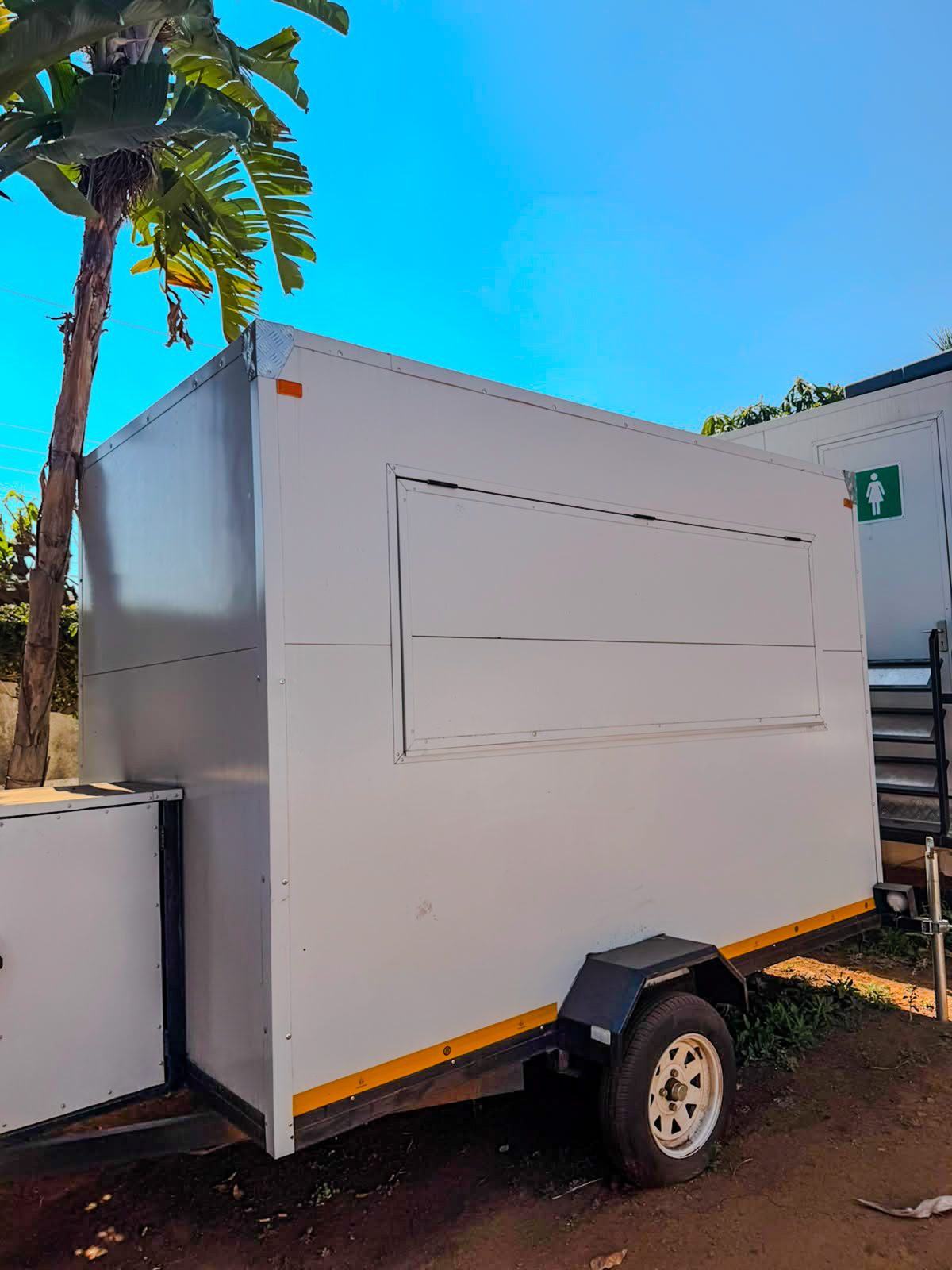 Frost & Flow mobile toilet trailer on site