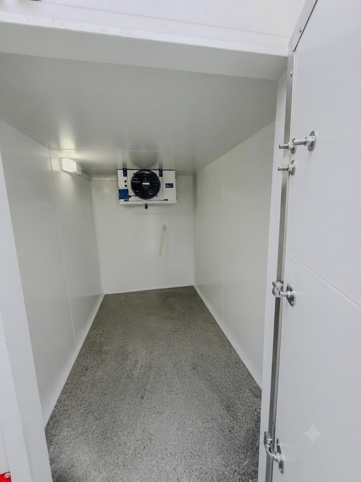 Inside a spacious mobile fridge unit